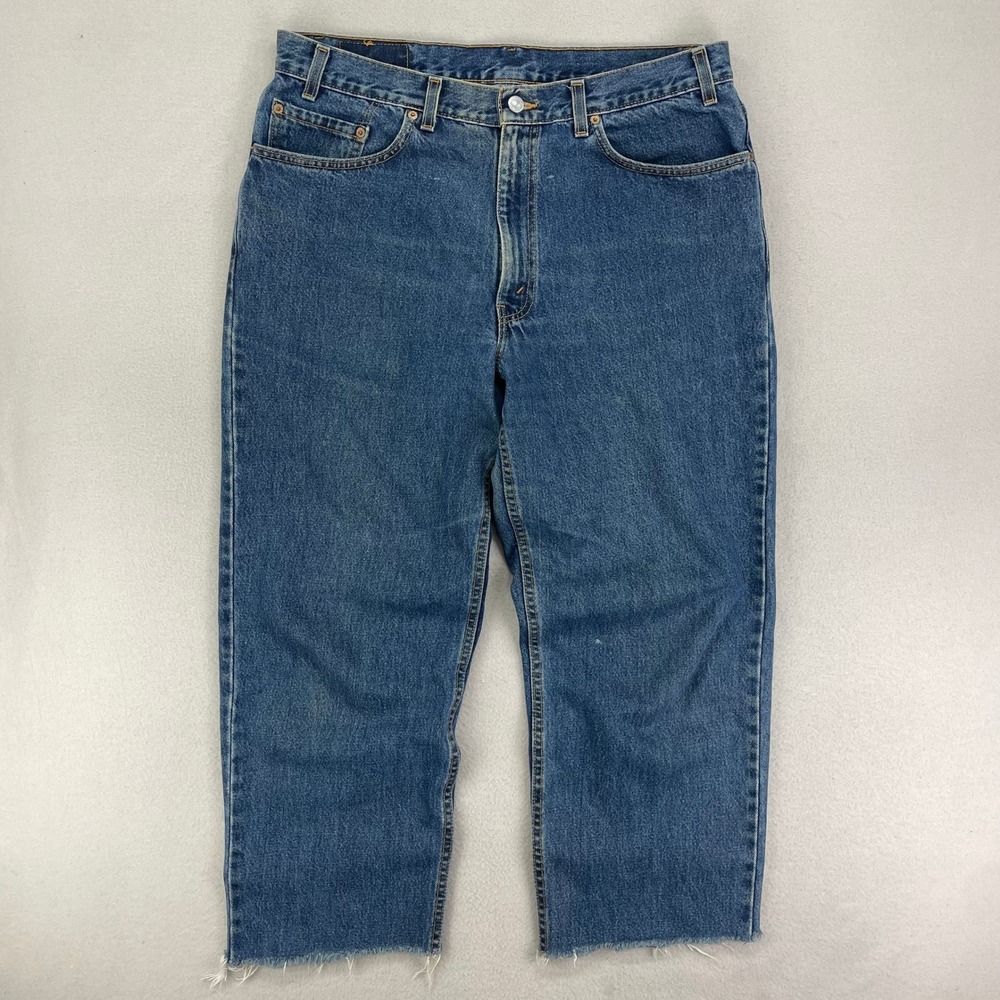 VTG Levi's Jeans 550 Mens 38x32 Blue Distressed Denim Relaxed made in USA Cut